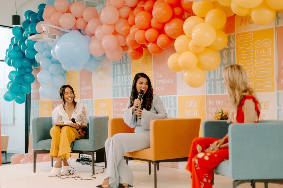 3 women at Bumble sitting in chairs for a panel discussion