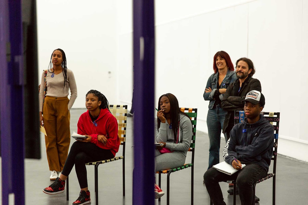 a group of people discussing ideas for Black History Month