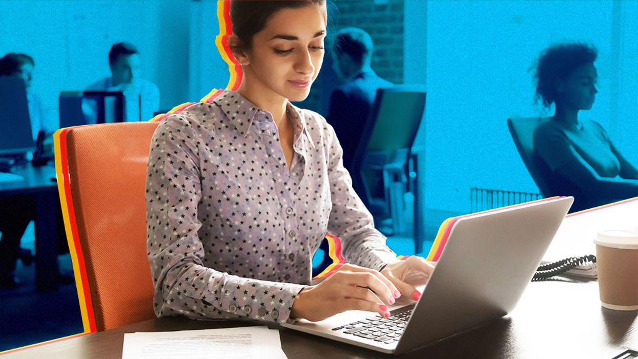 Woman typing on laptop in a coworking space in Nashville